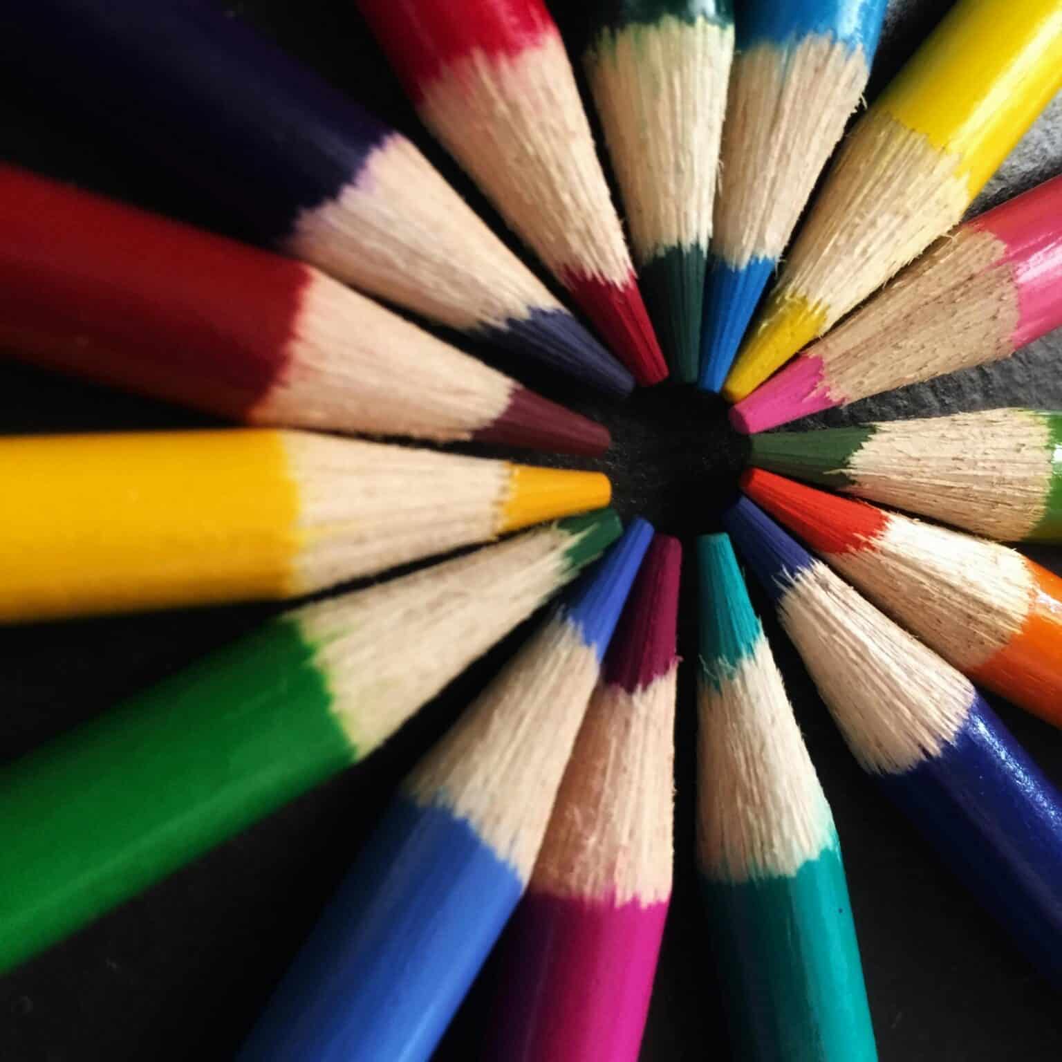 Back-to-school colored pencils arranged in a circle.