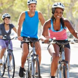 Smiling group of friends on bicycles